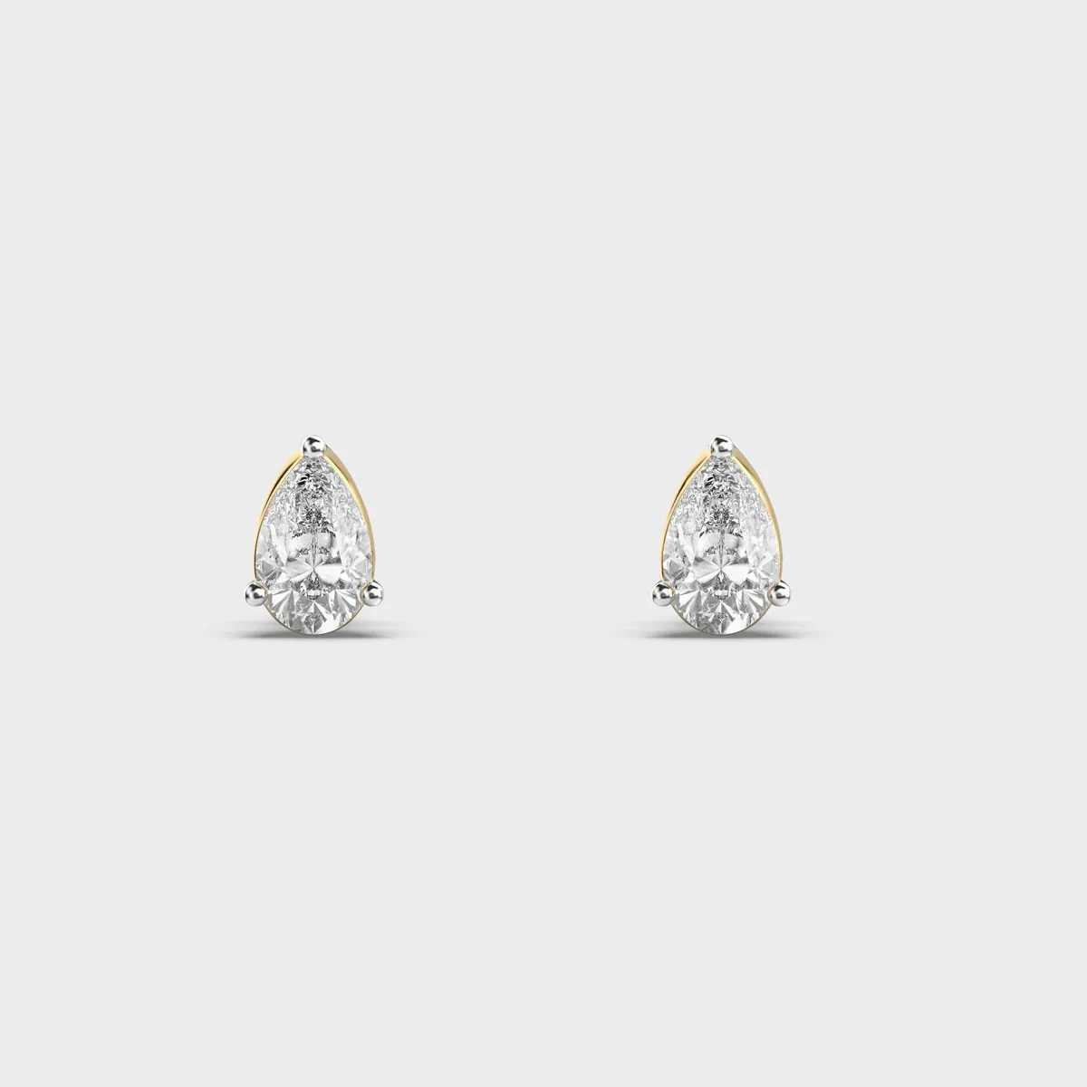 Simple Pear Cut Diamond Ear Studs